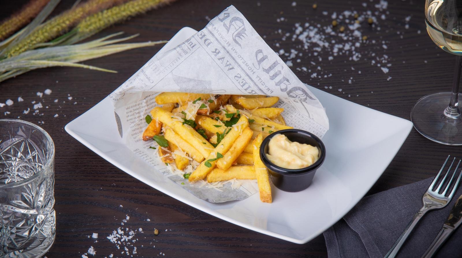 Mustakari’s country fries with Parmesan cheese and lemon aioli