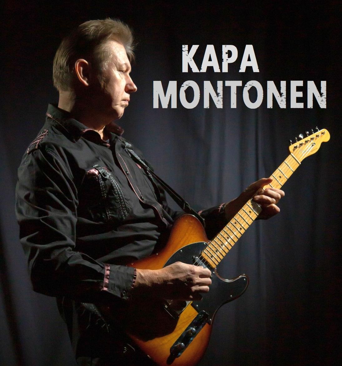 mies ja kitara Kapa Montonen Einon katutasossa vappupäivänä!