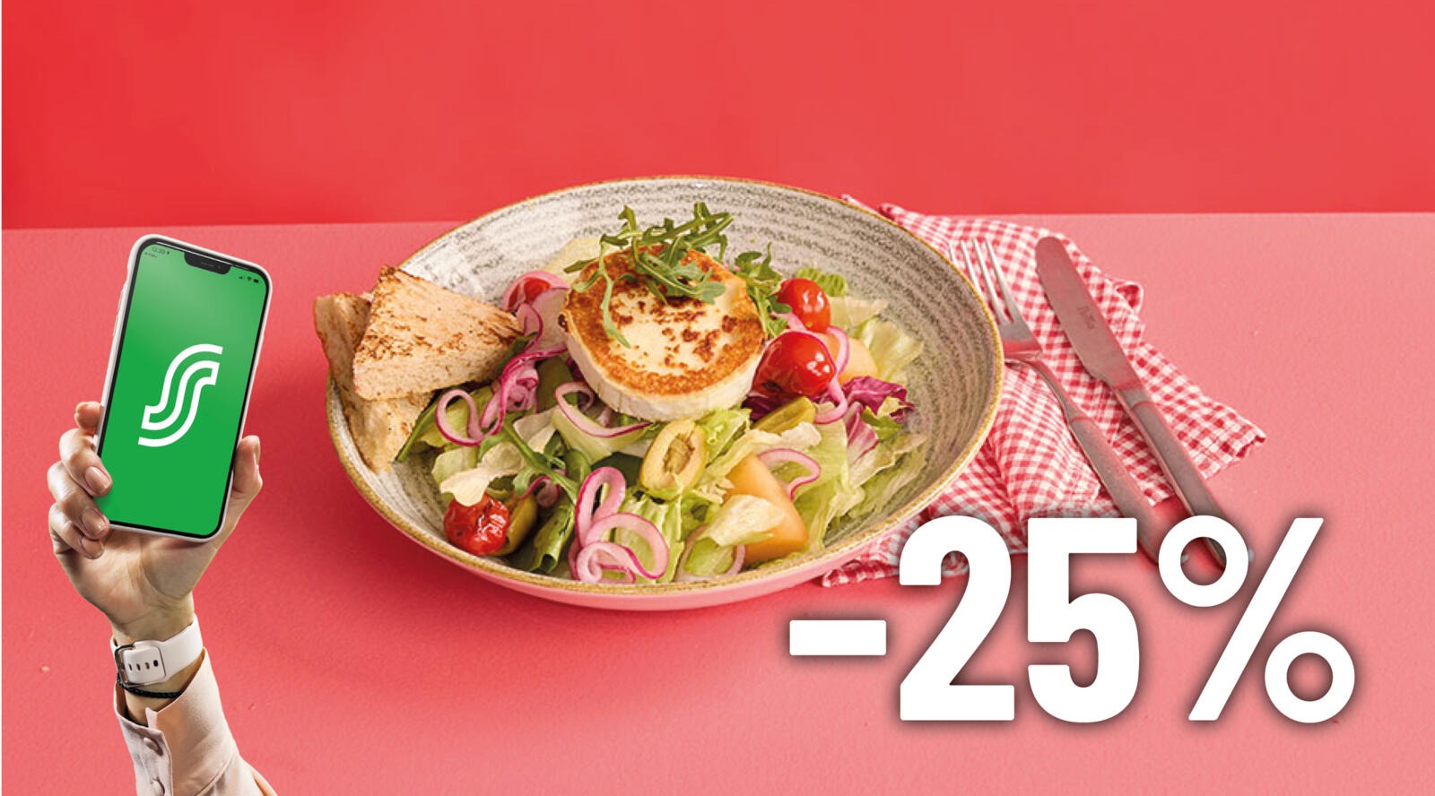 A plate of salad with grilled cheese against a light pink background.