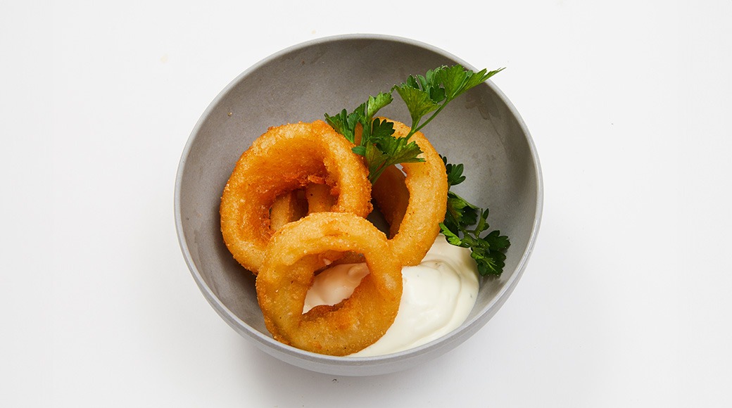 Beer-battered onion rings and blue cheese dip