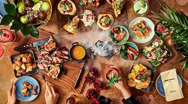 Four people dining.