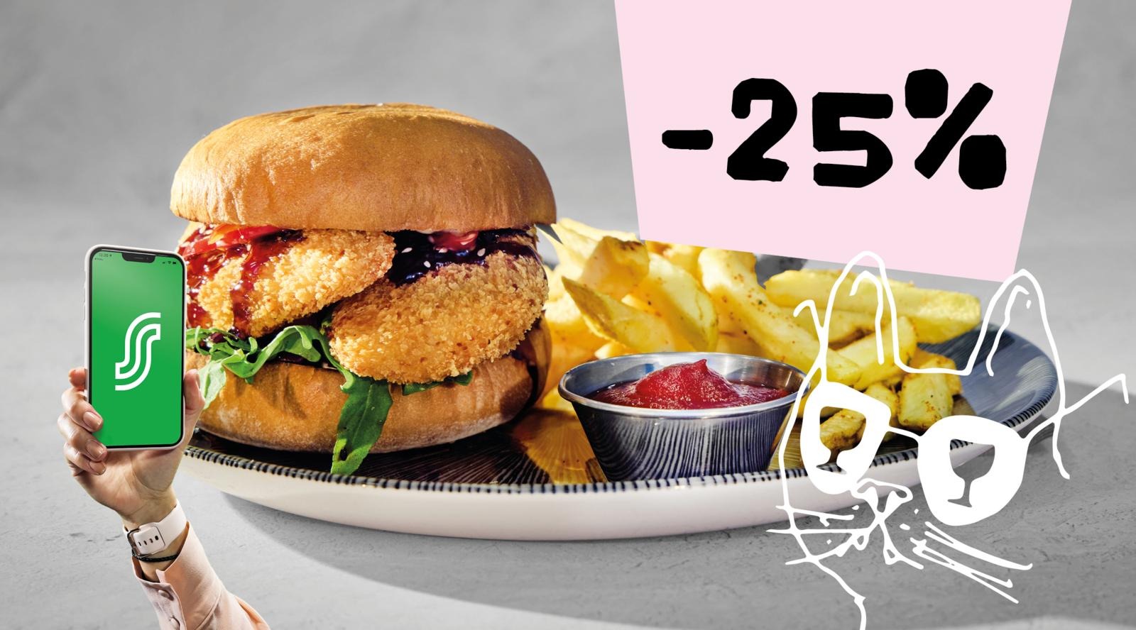 Hampurilaisateria, jossa paneroitu pihvi, ranskalaisia perunoita ja dippikastiketta. Vasemmalla käsi näyttää puhelinta, taustalla alennus.