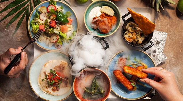Four people dining.