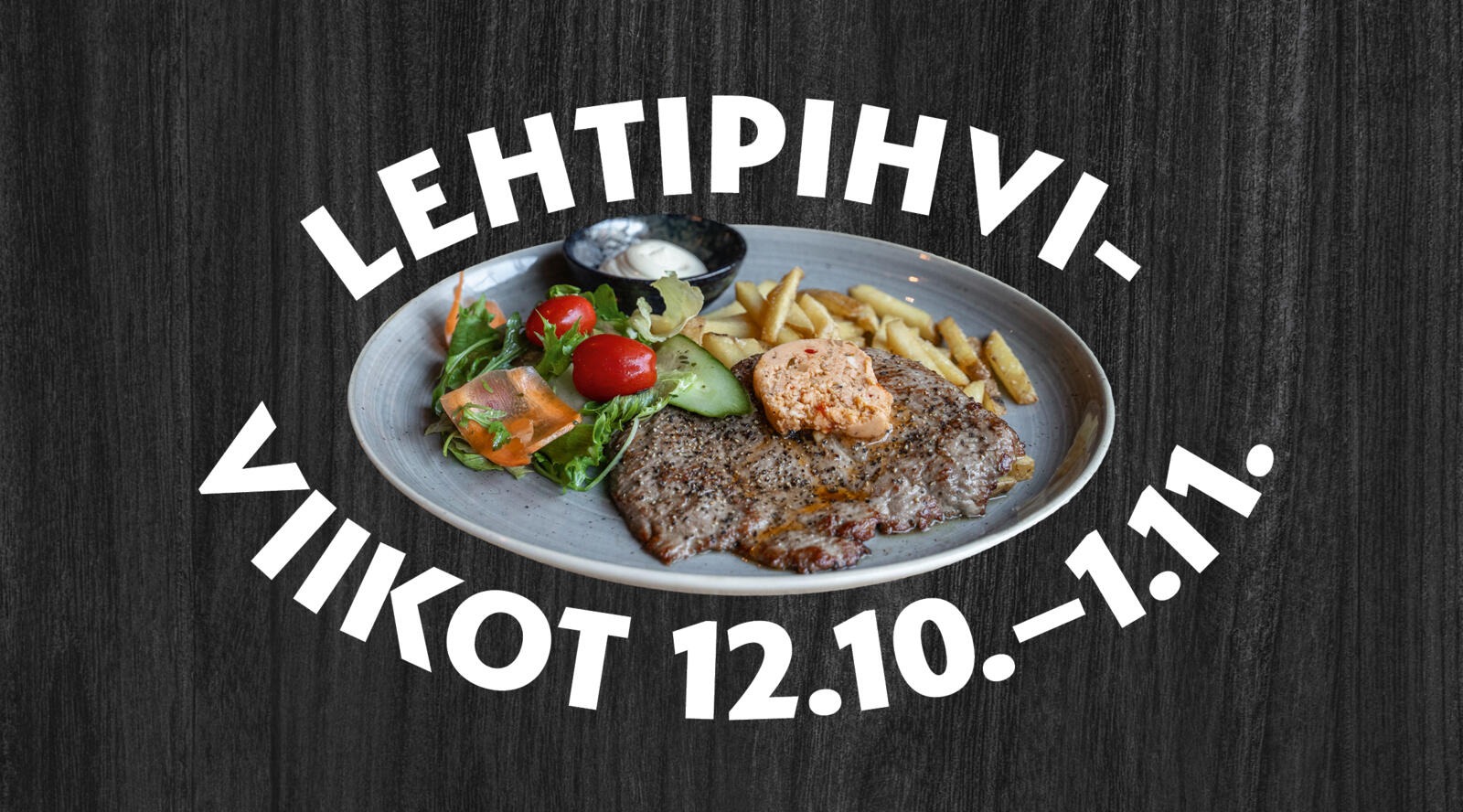 Naudan lehtipihviannos lautasella tummalla puutaustalla.