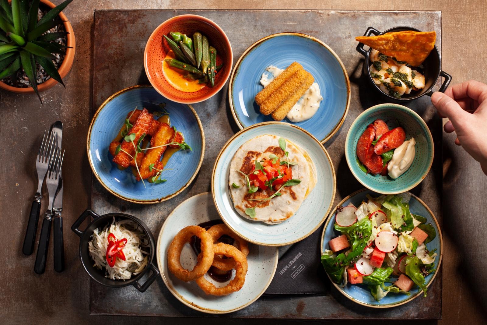 Four people dining.