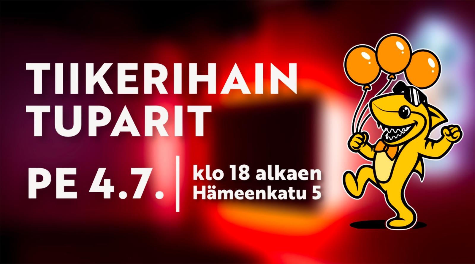 Tiikerihai maskotti tanssii ilmapallot käsissään