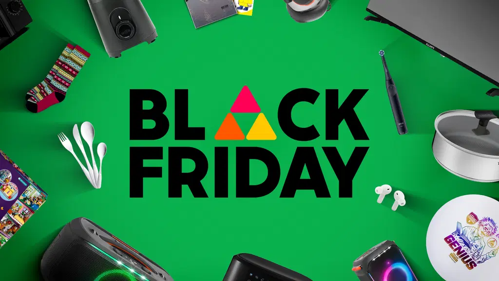 Black Friday -teksti ja käyttötavaroita vihreällä pohjalla.