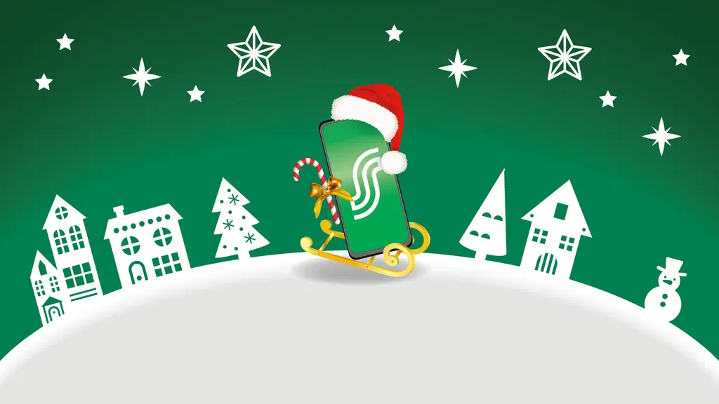 Jouluinen kännykkä kelkkailemassa talvimaisemassa.
