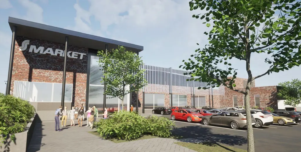 Havainnekuva S-market Riihimäki keskustan edestä. Vasemmalla sisäänkäynti ja oikealla parkkipaikka. 