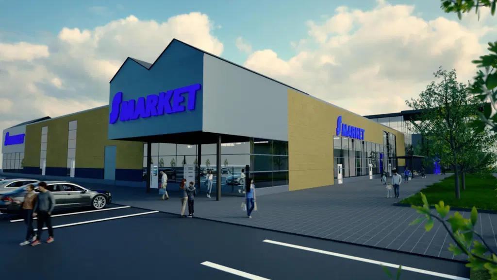 Kaupparakennuksen julkisivu, jossa on sininen "S-Market" -kyltti. Taustalla pilvinen taivas.
