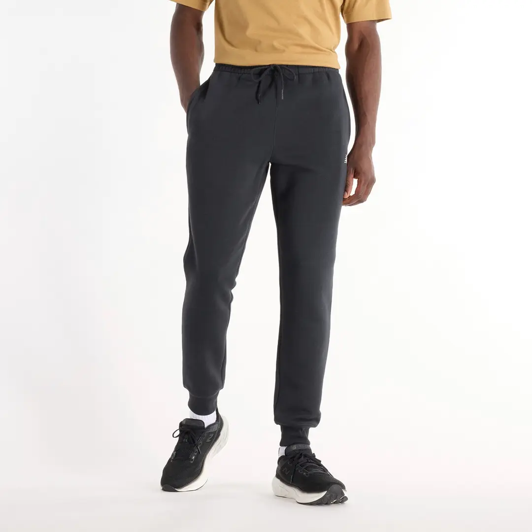 New Balance miesten collegehousut Sport Fleece Jogger