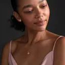 Lumoava Onnekas riipus