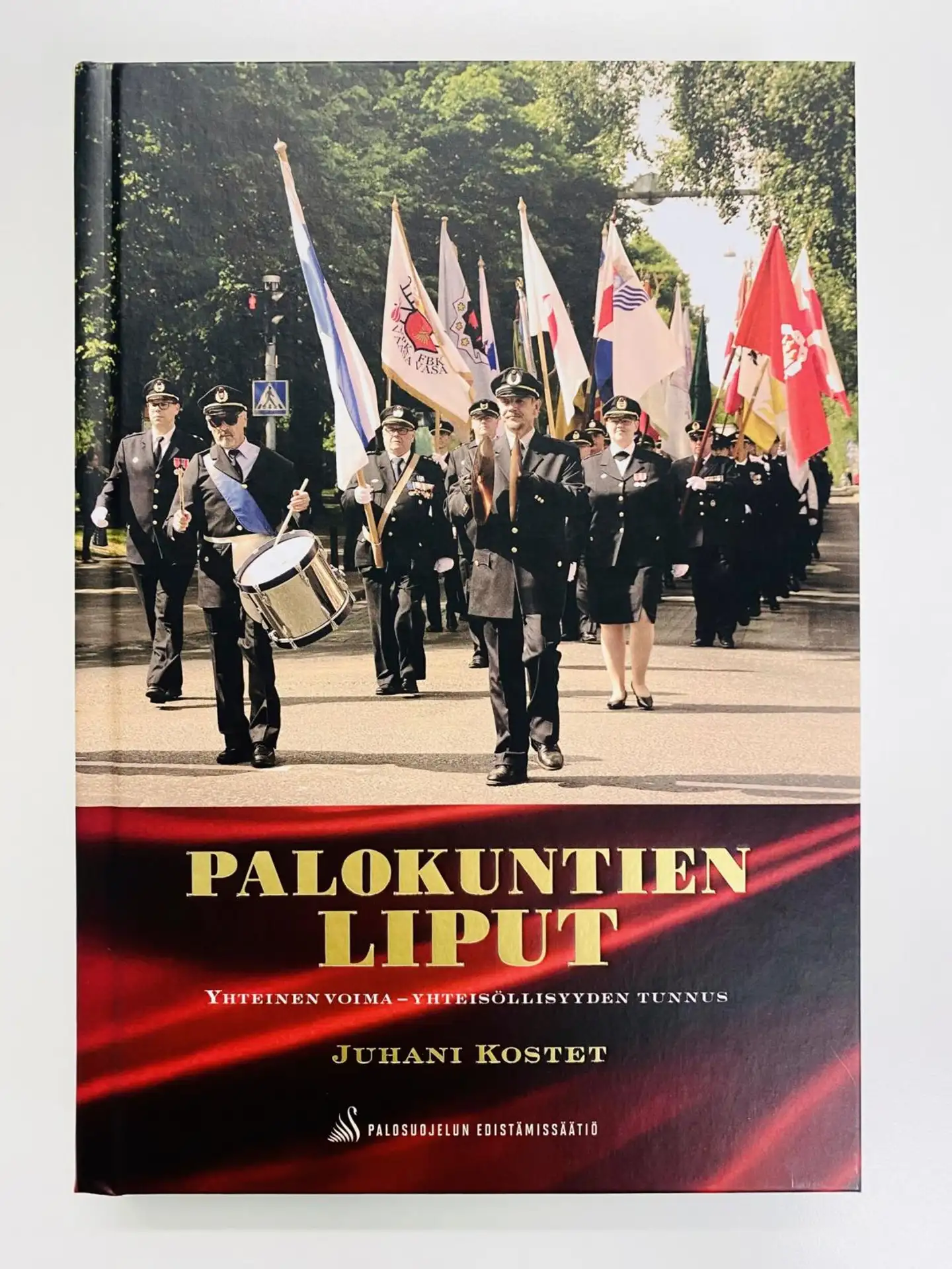 Kostet, Palokuntien liput - Yhteinen voima - yhteisöllisyyden tunnus