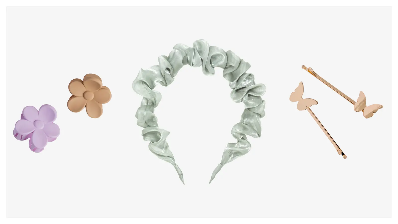 Laventelinvärinen ja ruskea kukkahiusklipsi, mintunvihreä hiuspanta ja kaksi kullanväristä perhospinniä.