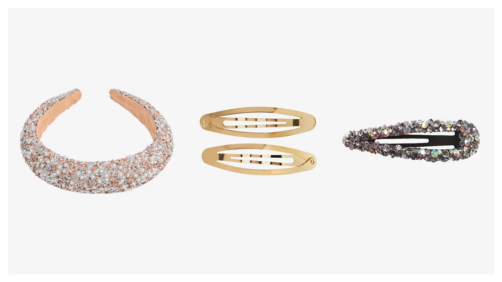 Kimaltava, helmin koristeltu hiuspanta, kaksi kullanväristä hiuspinniä ja hopea-musta hiussolki.