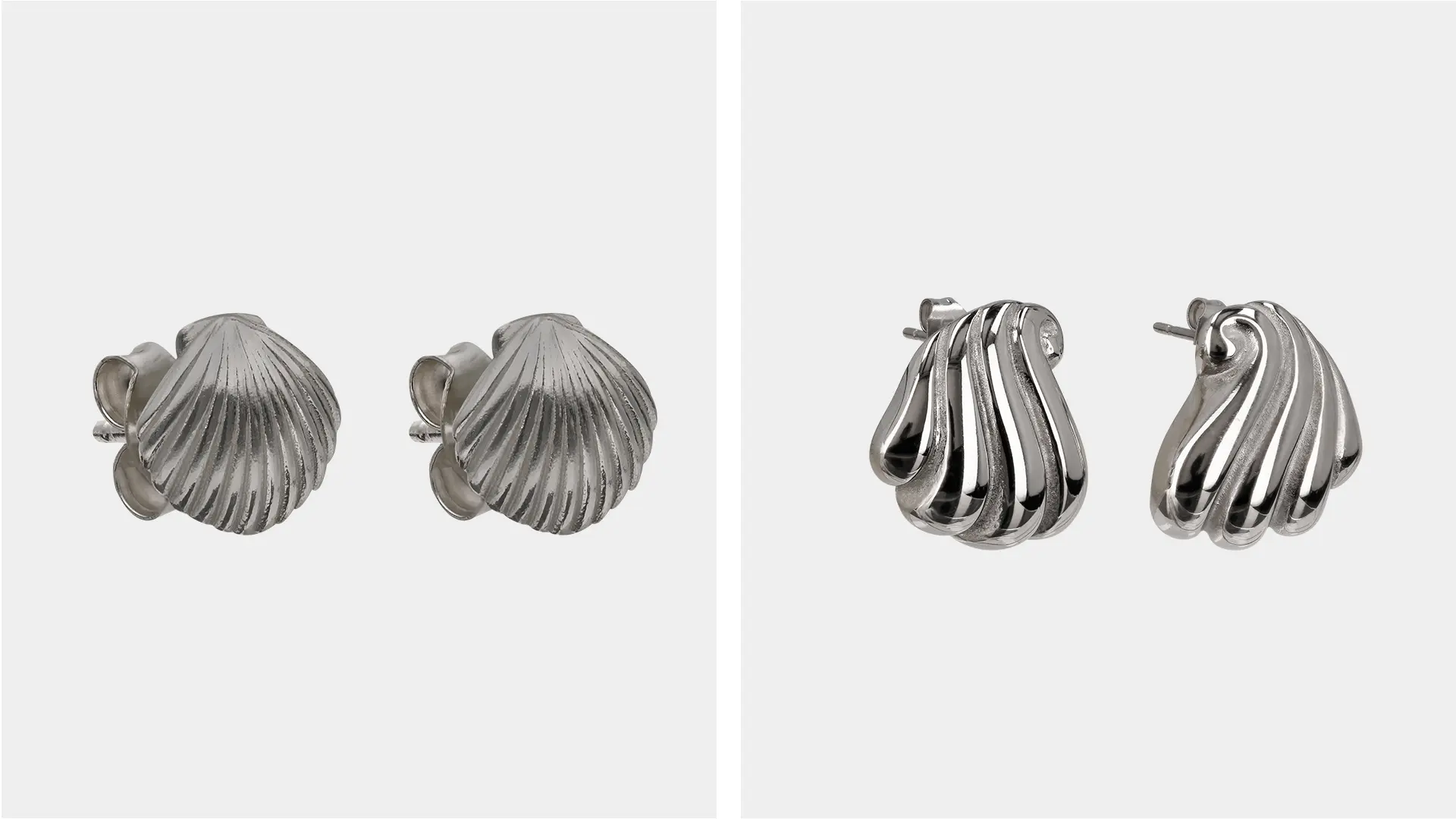 Kuvassa kahdet simpukkakorvakorut.