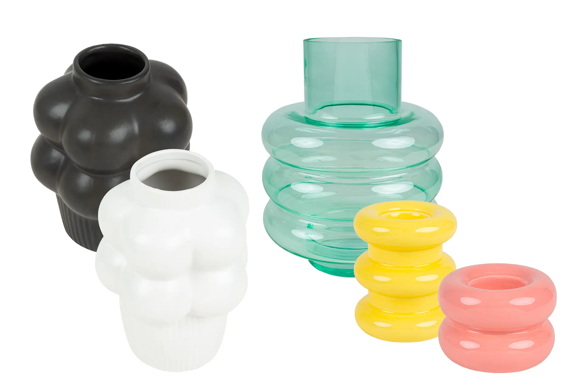 Pyöreälinjaisia maljakoita ja kynttiläjalkoja