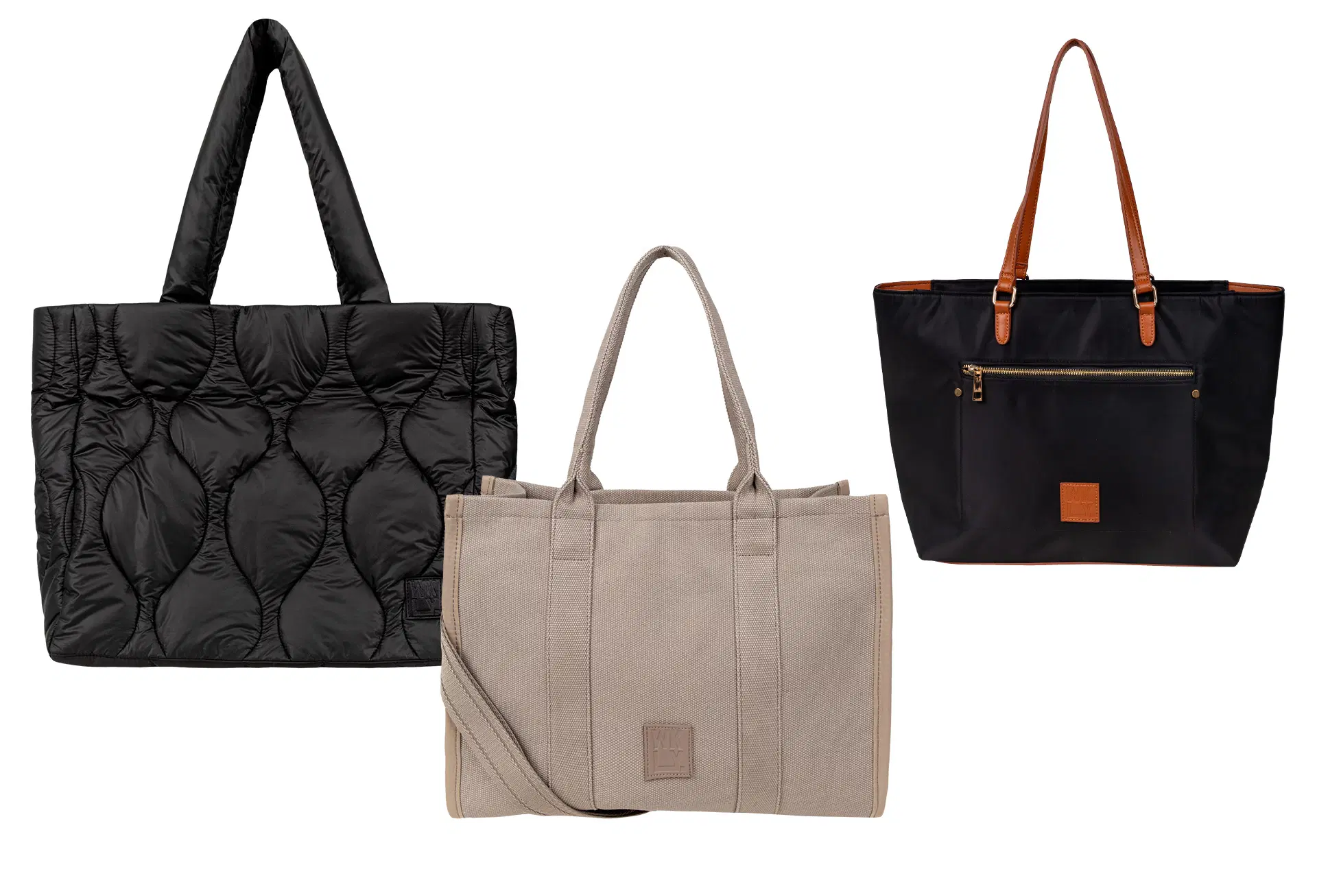 Kuvassa kaksi isoa mustaa ja yksi iso beige tote bag.