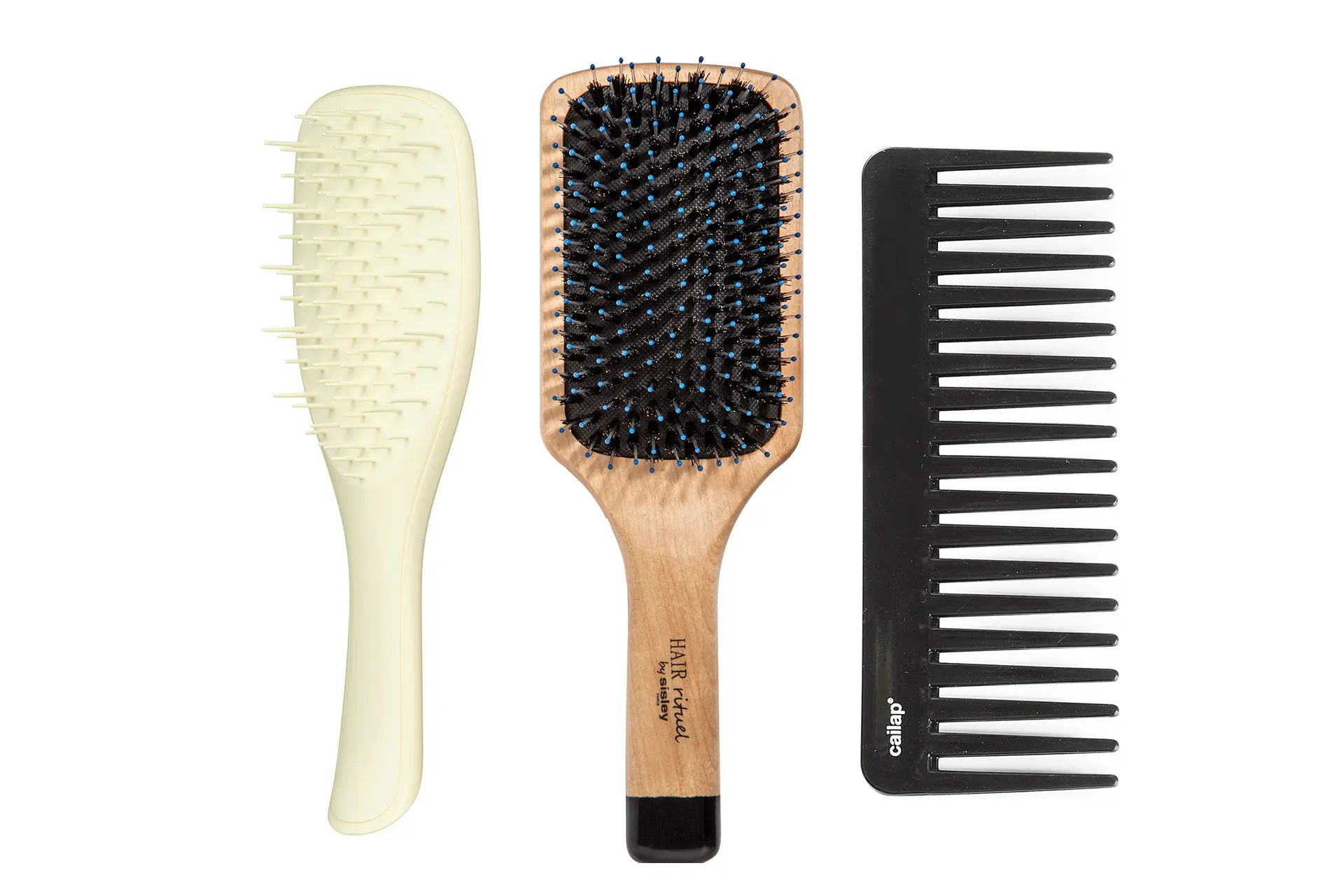 Kolme erilaista hiusharjaa