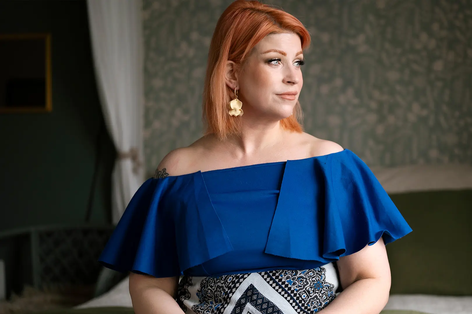 Siniseen paitaan pukeutunut Sohlberg