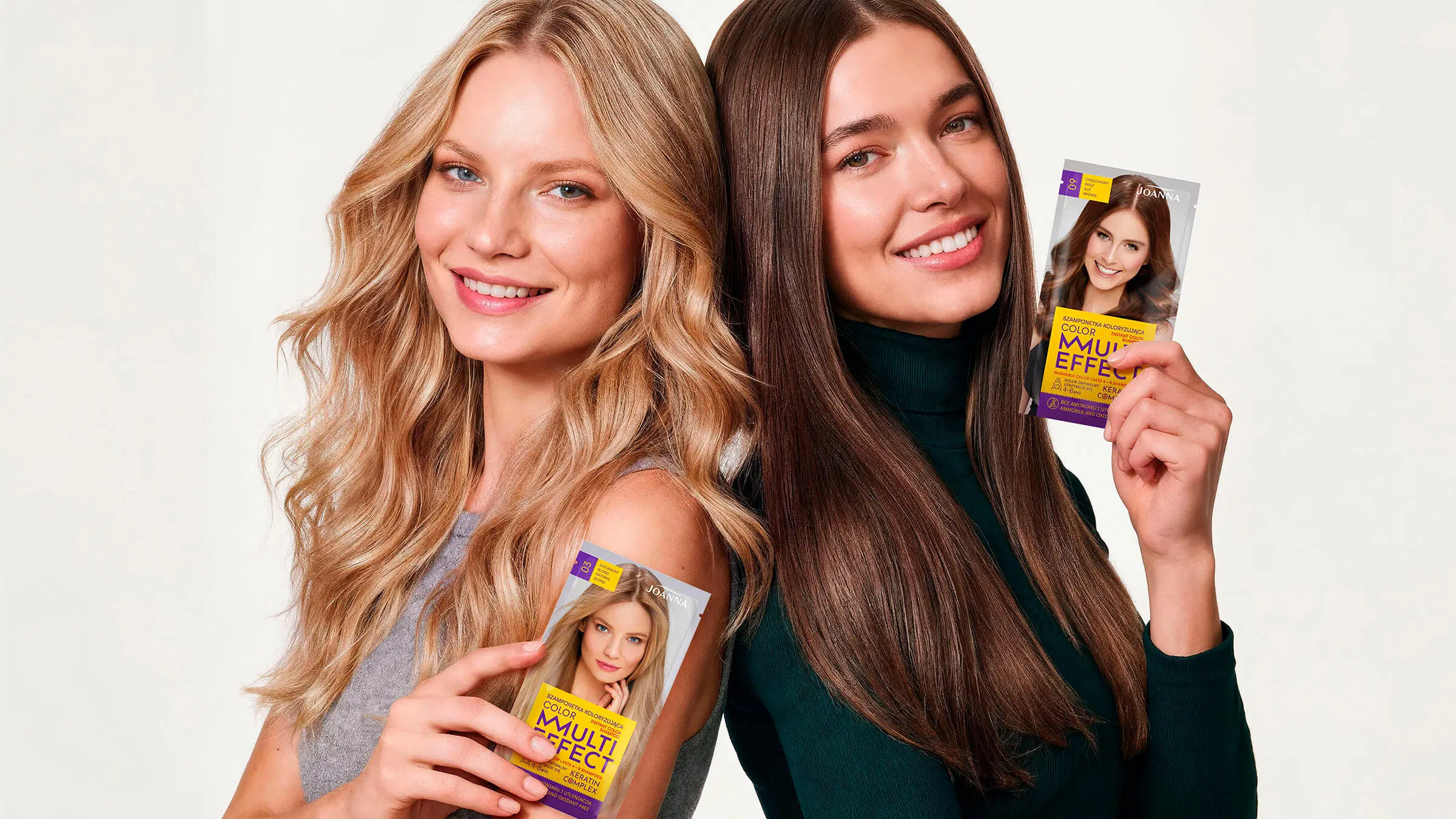 Vaaleahiuksinen ja tummahiuksinen nainen pitelevät Joanna Multi Effect -shampoopakkauksia omissa hiusväreissään.