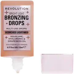 Makeup Revolution Bright Light hehkua antavat meikkitipat 23ml Golden Star Dew - Bronze Scorched - 2