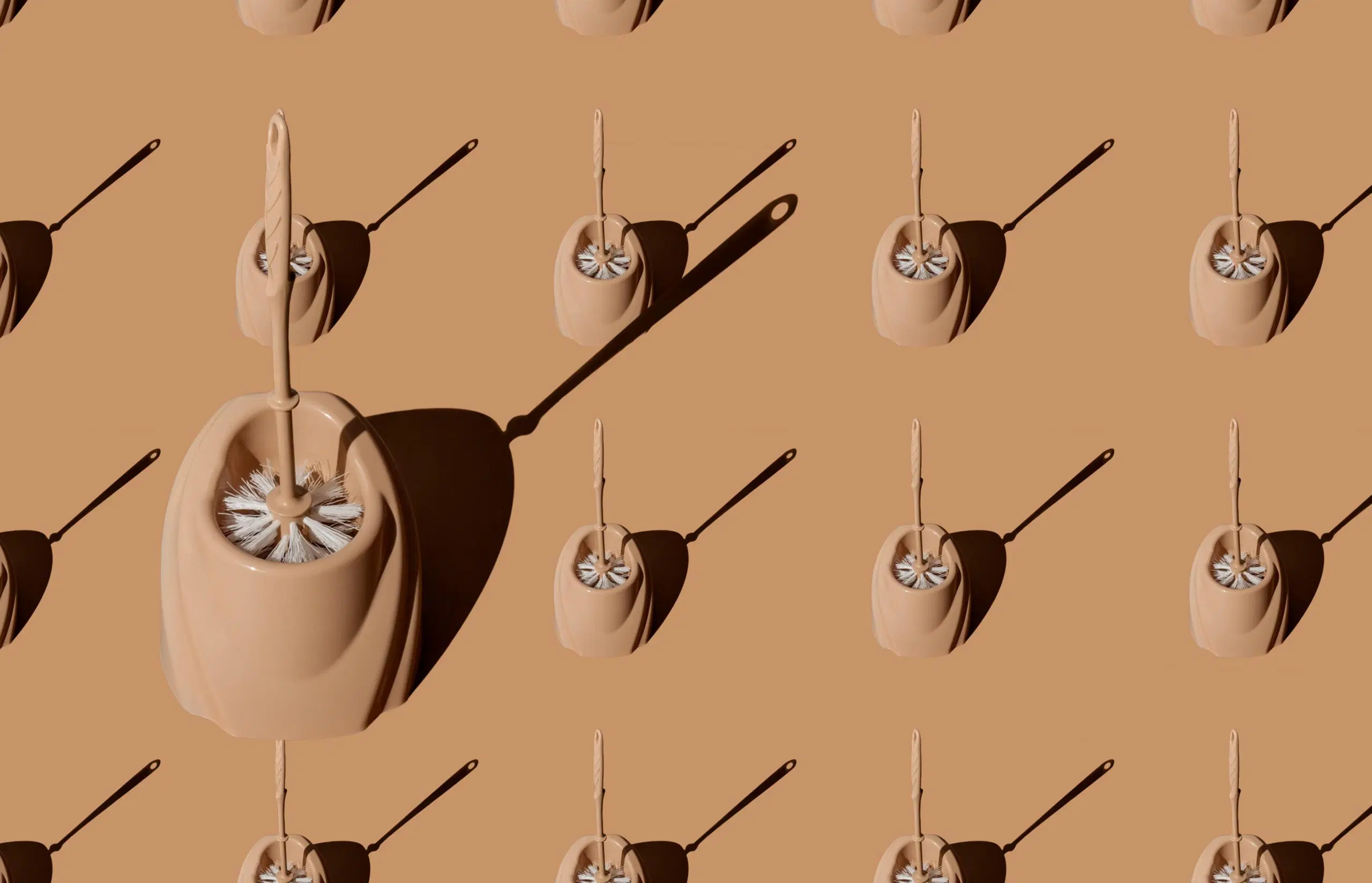 Beigejä wc-harjoja beigellä pohjalla