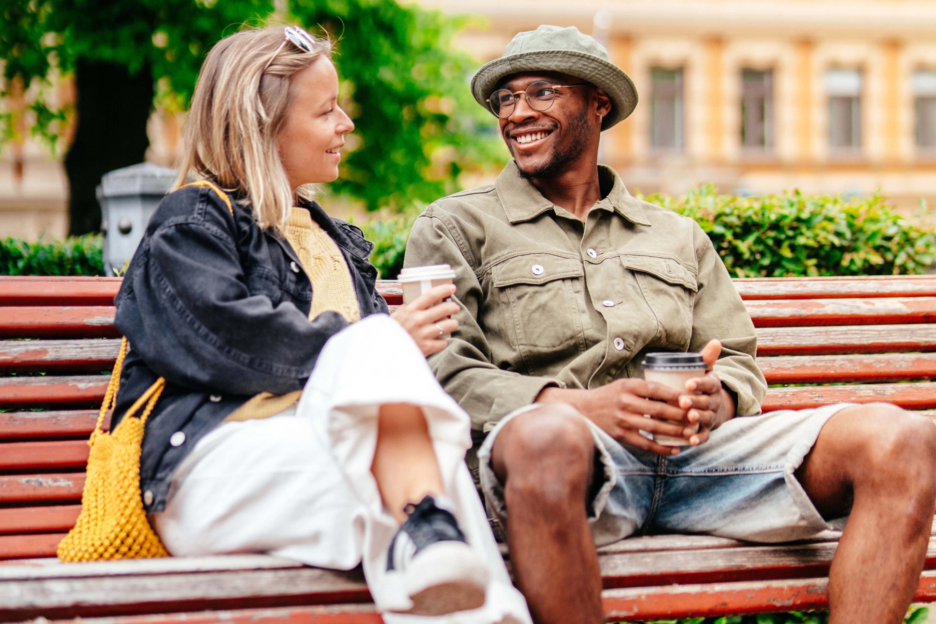 A couple having coffee in the park.