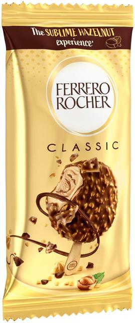 Ferrero Rocher Classic-jäätelö 50g. Hasselpähkinän makuista jäätelöä (54,9%) hasselpähkinä- ja kaakaoraidoilla (6,1%) - päällä maitosuklaata ja hasselpähkinäpaloja.