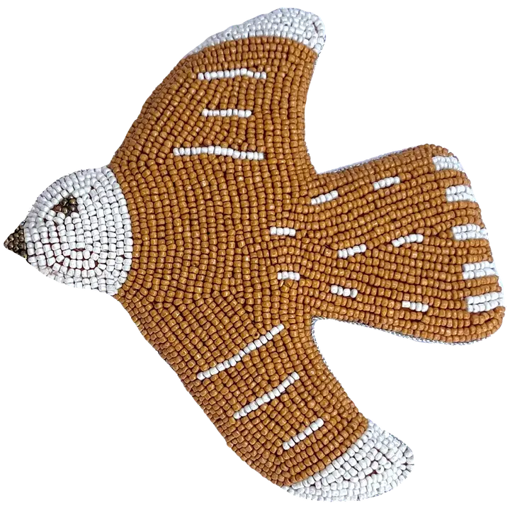 Mum's seinäkoriste Oranssilintunen, nokka vasemmalla