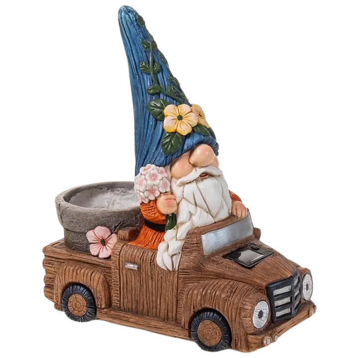 Puutarhatonttu ja auto valoilla