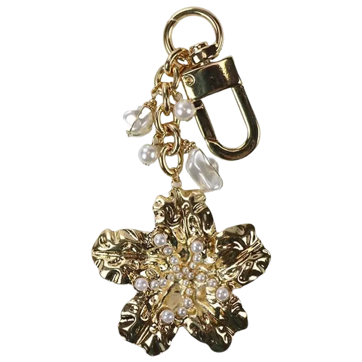 Accessories with Style Laukkukoru kukka helmi kullanvärinen