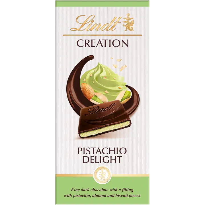 Lindt CRÉATION Hienoa tummaa suklaata kermaisella pistaasipähkinätäytteellä sekä manteli- ja keksinpaloja 150g