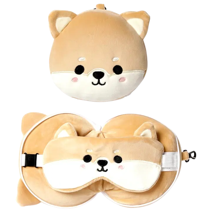 Reisipadi ja silmamaskiga koer