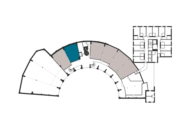 Floor plan with highlighted space located in curved section of building. Corridor leads to the space from inner courtyard.